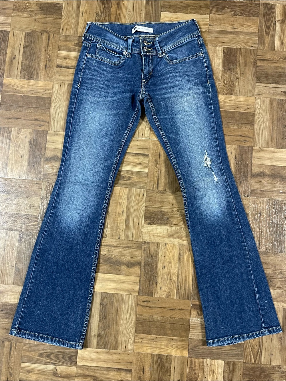 Levi's 524 Too Superlow Women's Blue Flare Jeans with Knee Distress